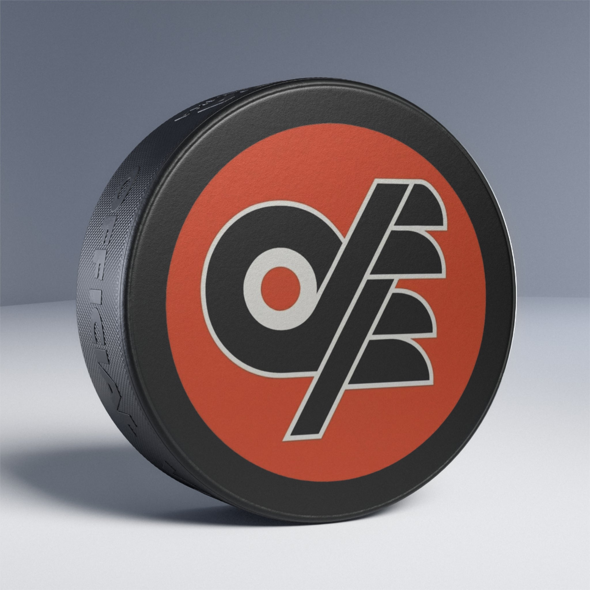 Retro DFF Flyers Hockey Puck – Vintage Orange & Black Team Logo Puck